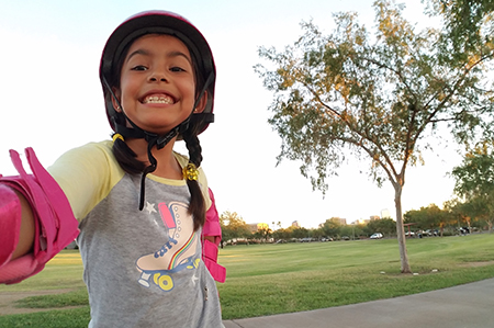 girl-with-helmet-smiling