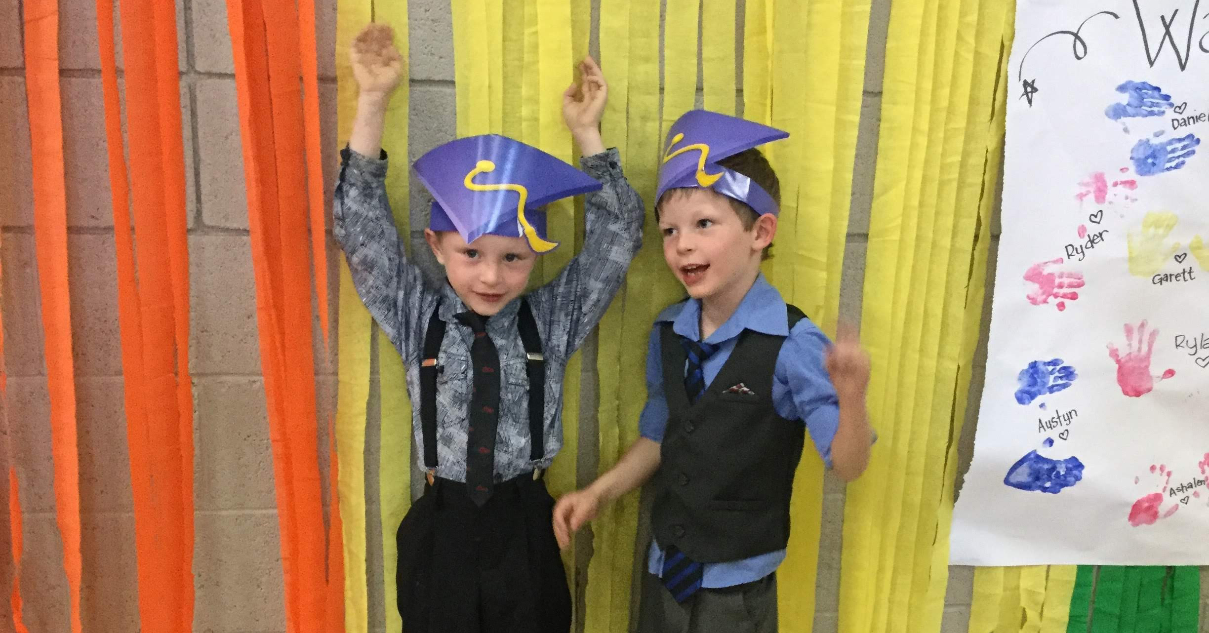 brothers at graduation ceremony